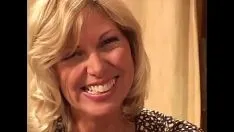 Play The 55-year-old woman penetrates deep into her pussy with 19-year-old puppies