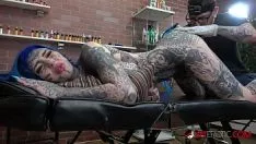 Play Tattooed masturbates hard with that big, thick dildo