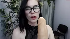 Play Teen in Tight Glasses Gets Intimate with a Giant Dildo